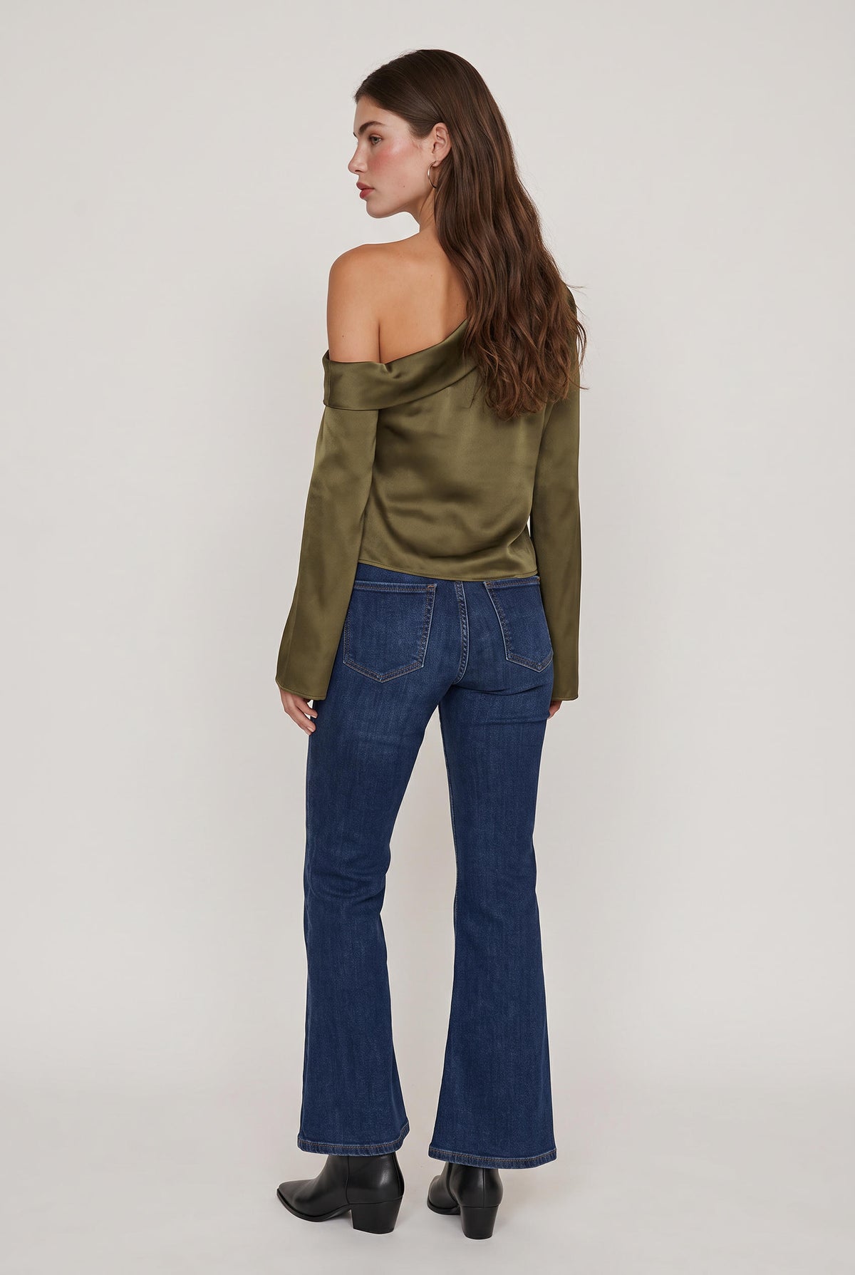 model wearing Celeste Asymmetrical Top posing Front View