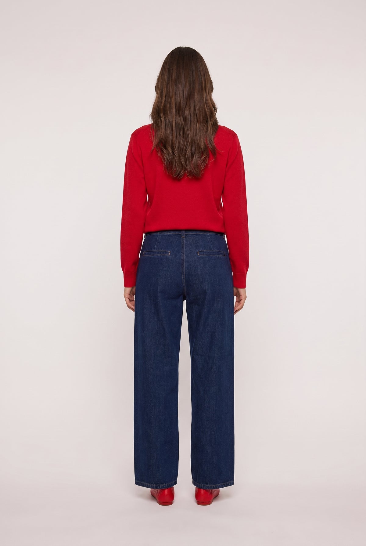 model wearing Denim Trouser posing Back View