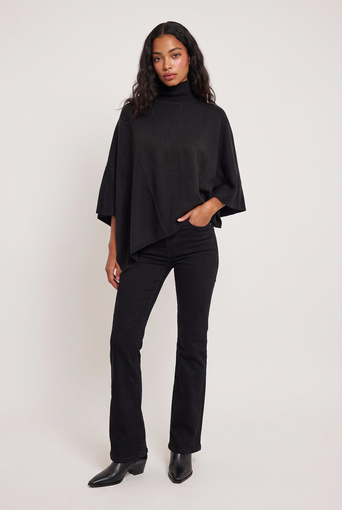 model wearing Tiwa Cape posing Front View