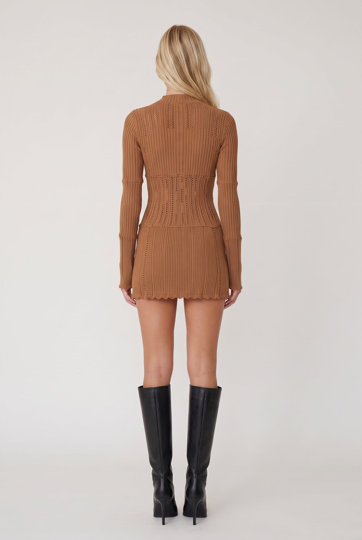 model wearing The Amara Dress posing Back View