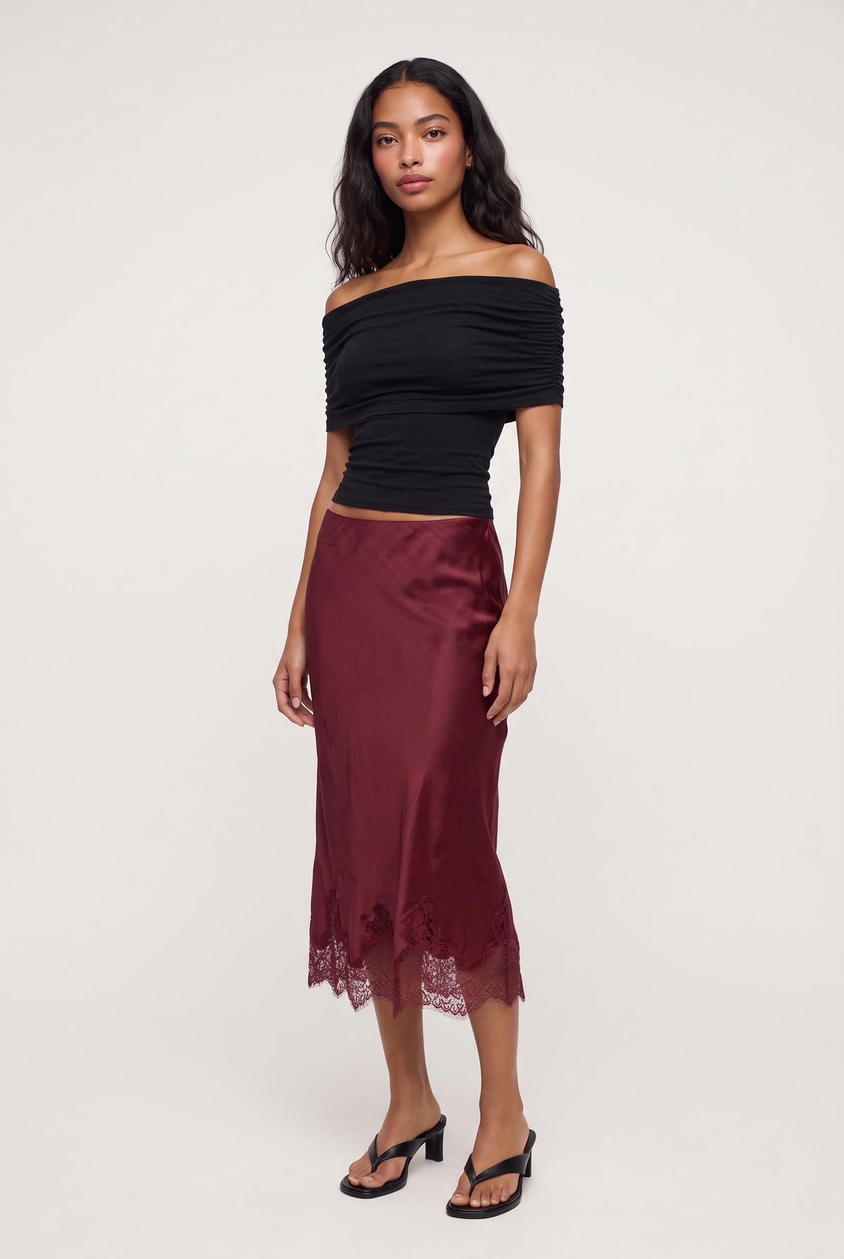 model wearing LUCIA LACE SLIP SKIRT posing Front View