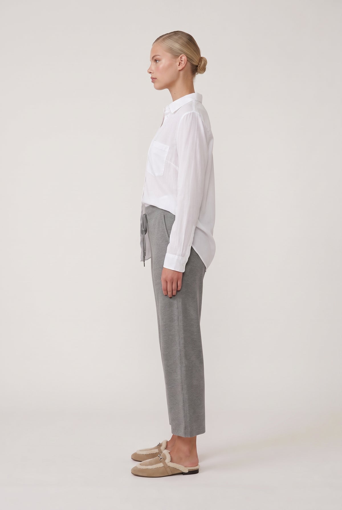 
model wearing Classic Button Front posing Side View