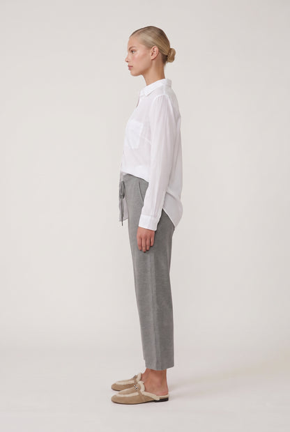 
model wearing Classic Button Front posing Side View