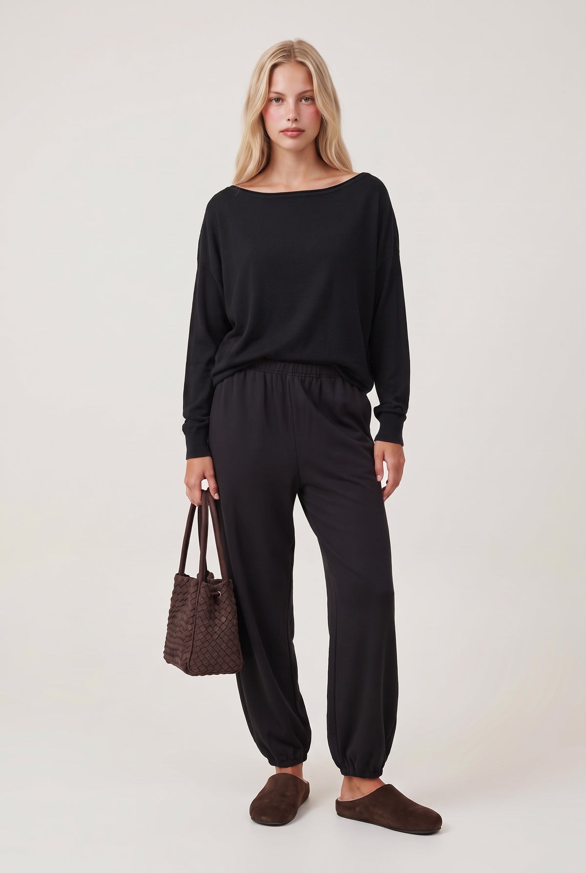 [BLACK] model wearing Drop Slv Boat Neck Top posing Front View