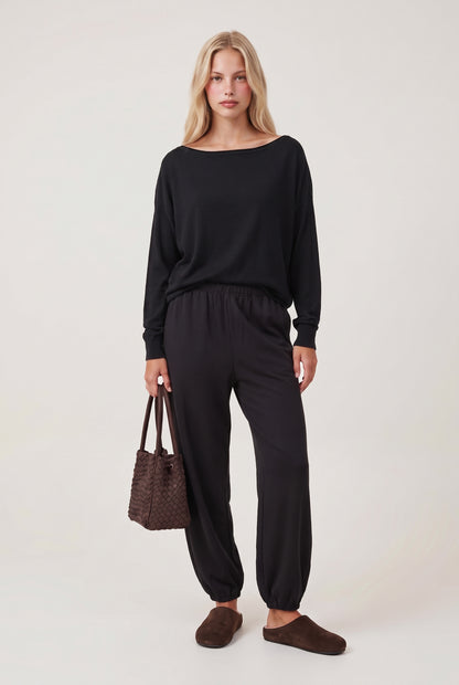 
model wearing Drop Slv Boat Neck Top posing Front View