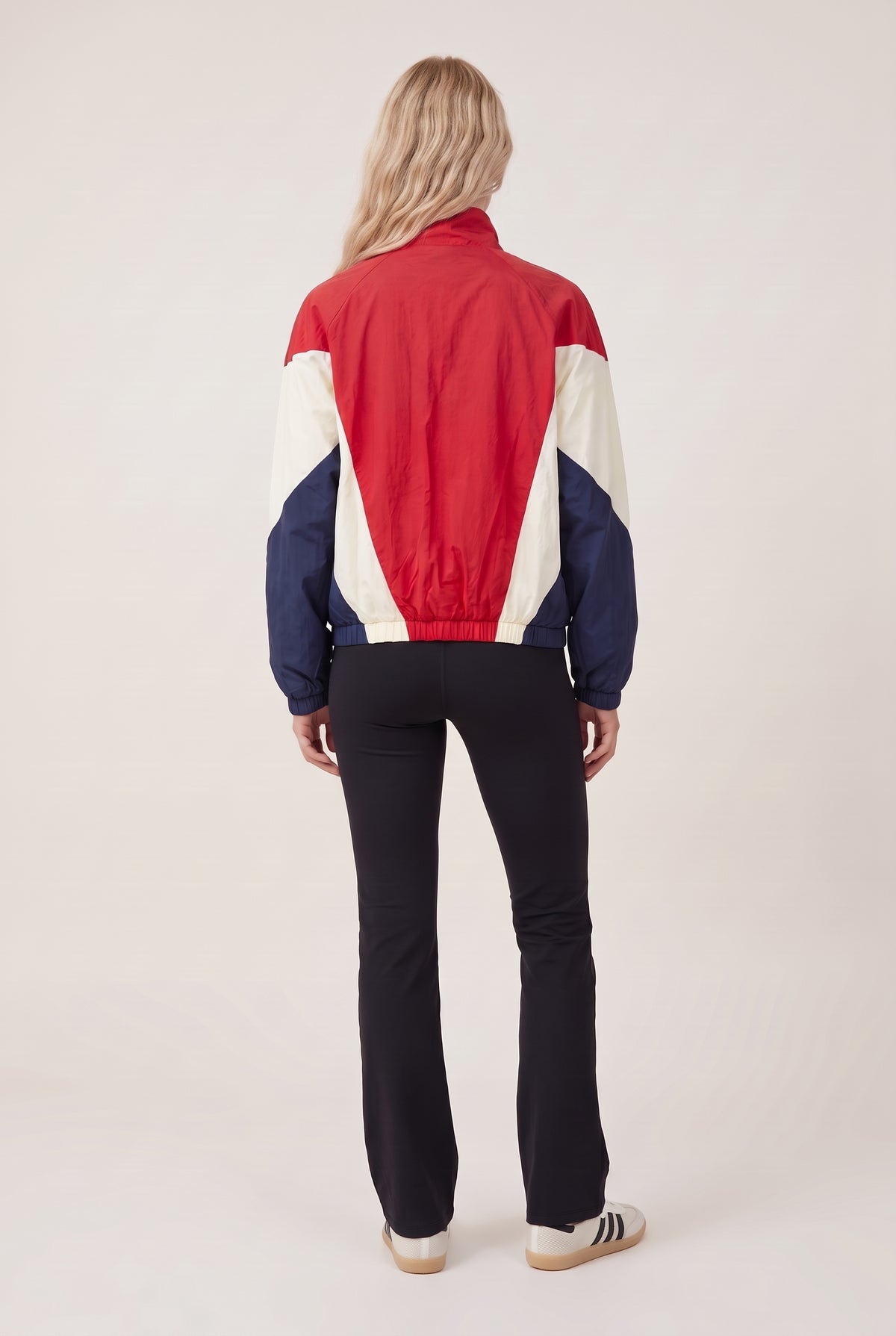 
model wearing 90'S TRACK JACKET posing Front View