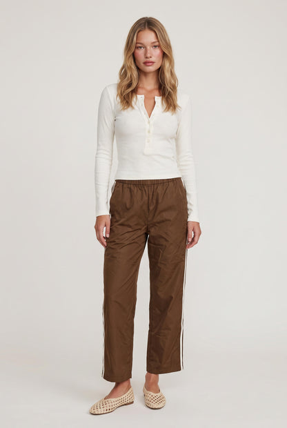 
model wearing DOWNTOWN TRACK PANT posing Front View