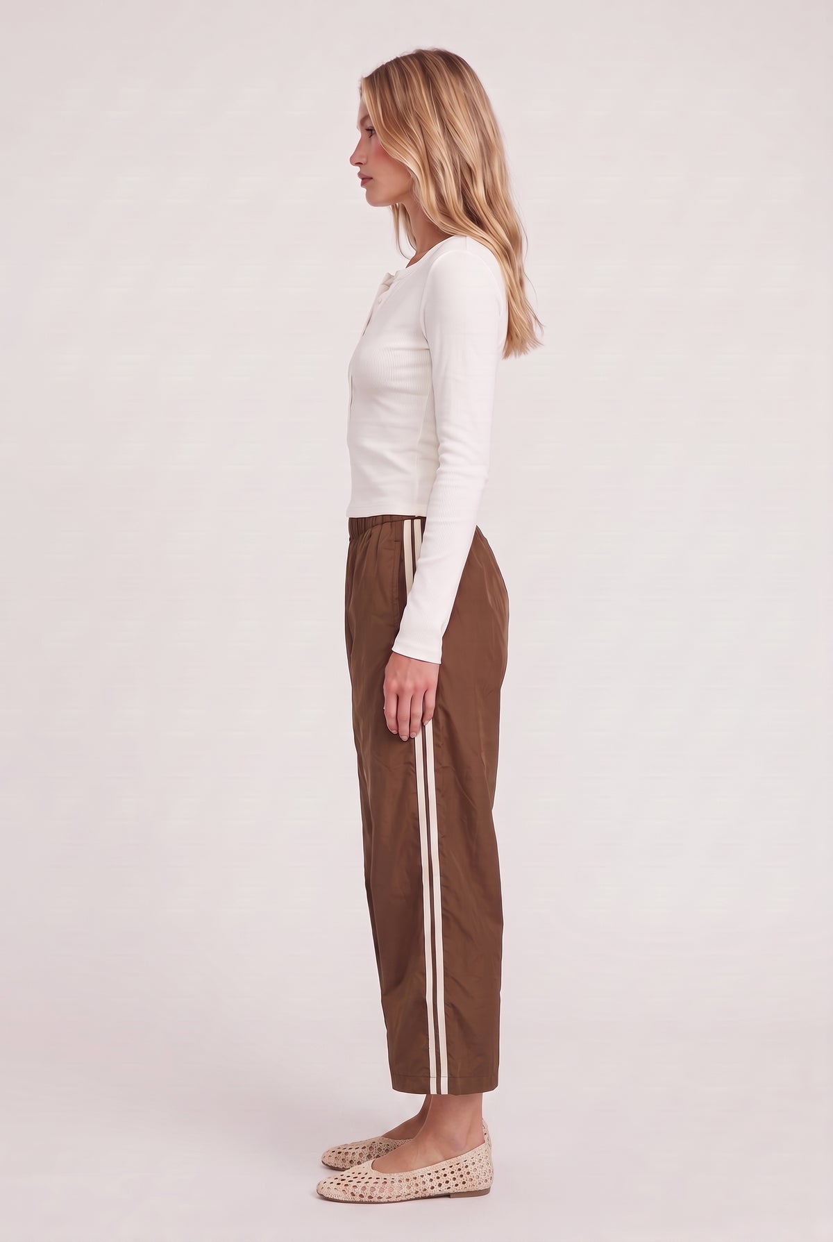 
model wearing DOWNTOWN TRACK PANT posing Front View