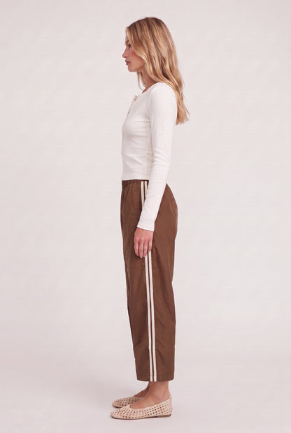 
model wearing DOWNTOWN TRACK PANT posing Front View