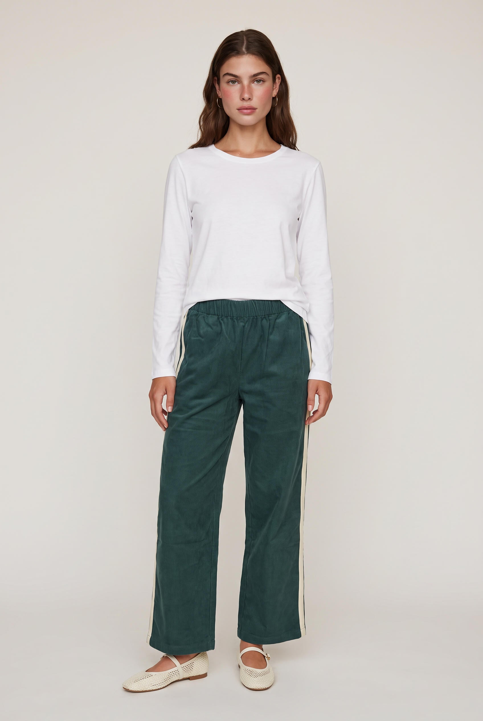 [GREEN] model wearing DOWNTOWN TRACK PANT posing Front View