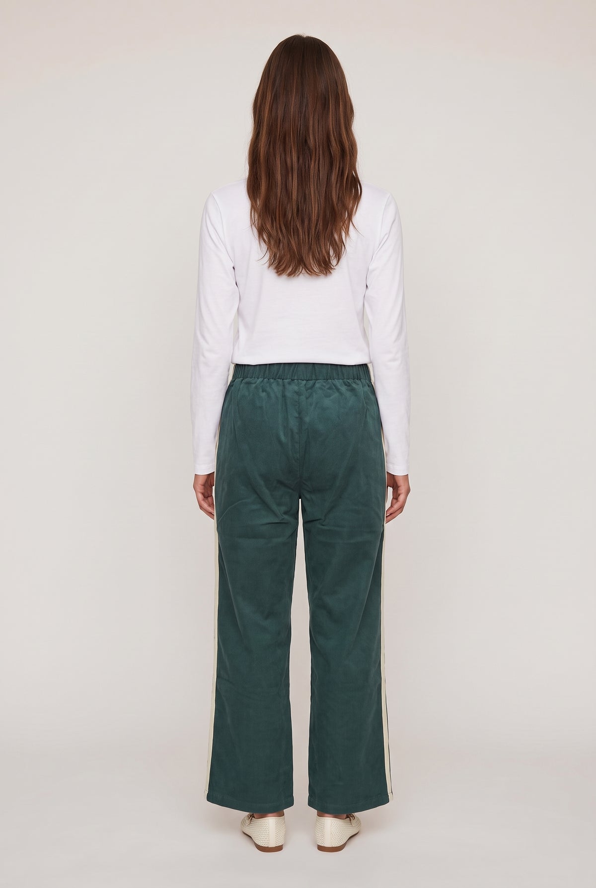 
model wearing DOWNTOWN TRACK PANT posing Back View