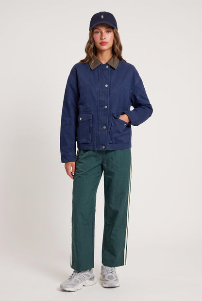 
model wearing Downtown Track Pant posing Front View