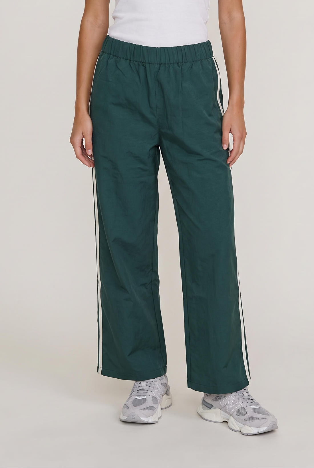 
model wearing Downtown Track Pant posing Front View