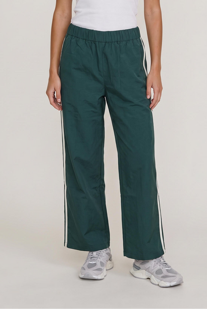 
model wearing Downtown Track Pant posing Front View