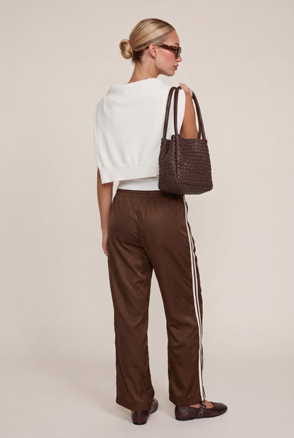 
model wearing Downtown Track Pant posing Front View
