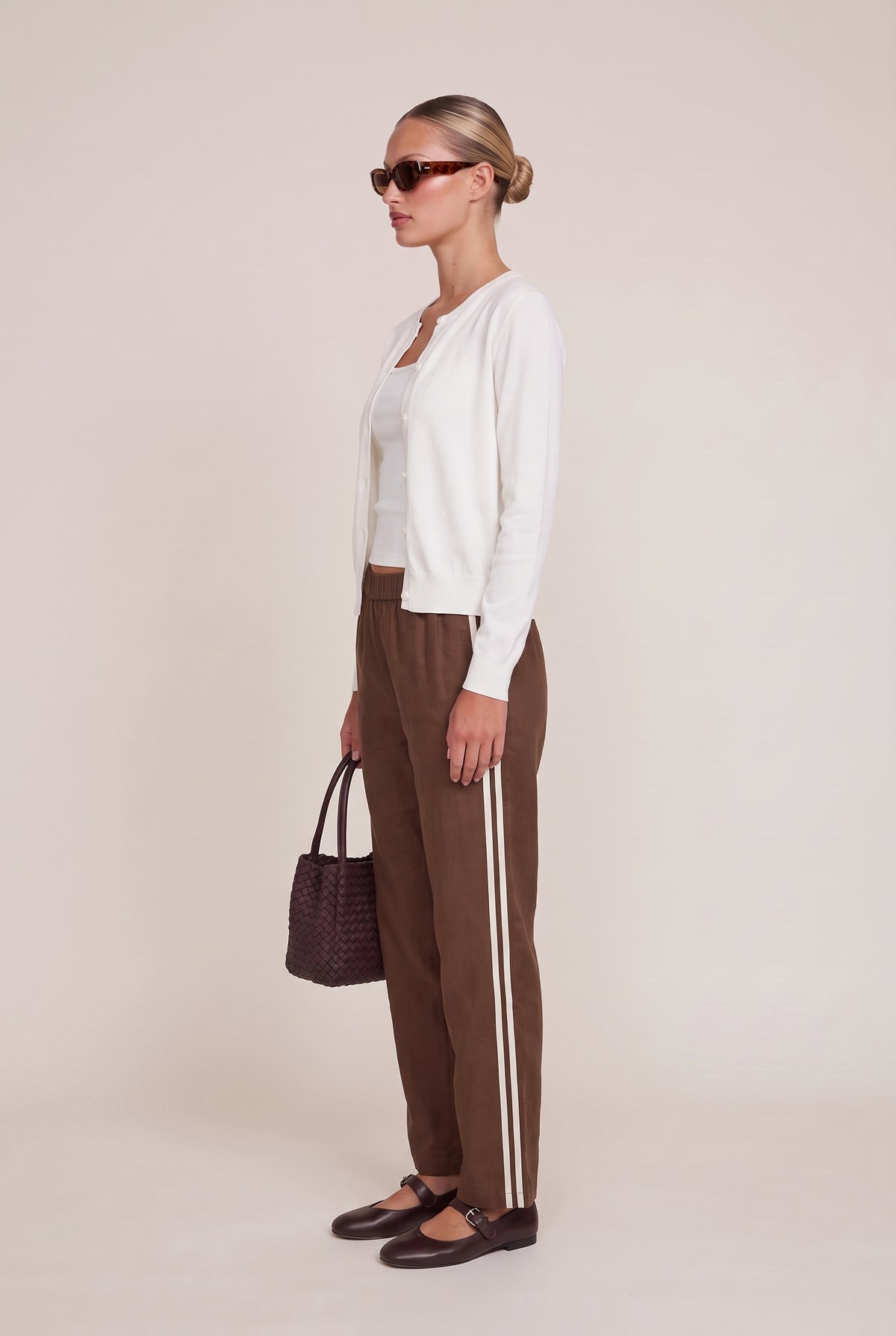 [BROWN] model wearing Downtown Track Pant posing Side View