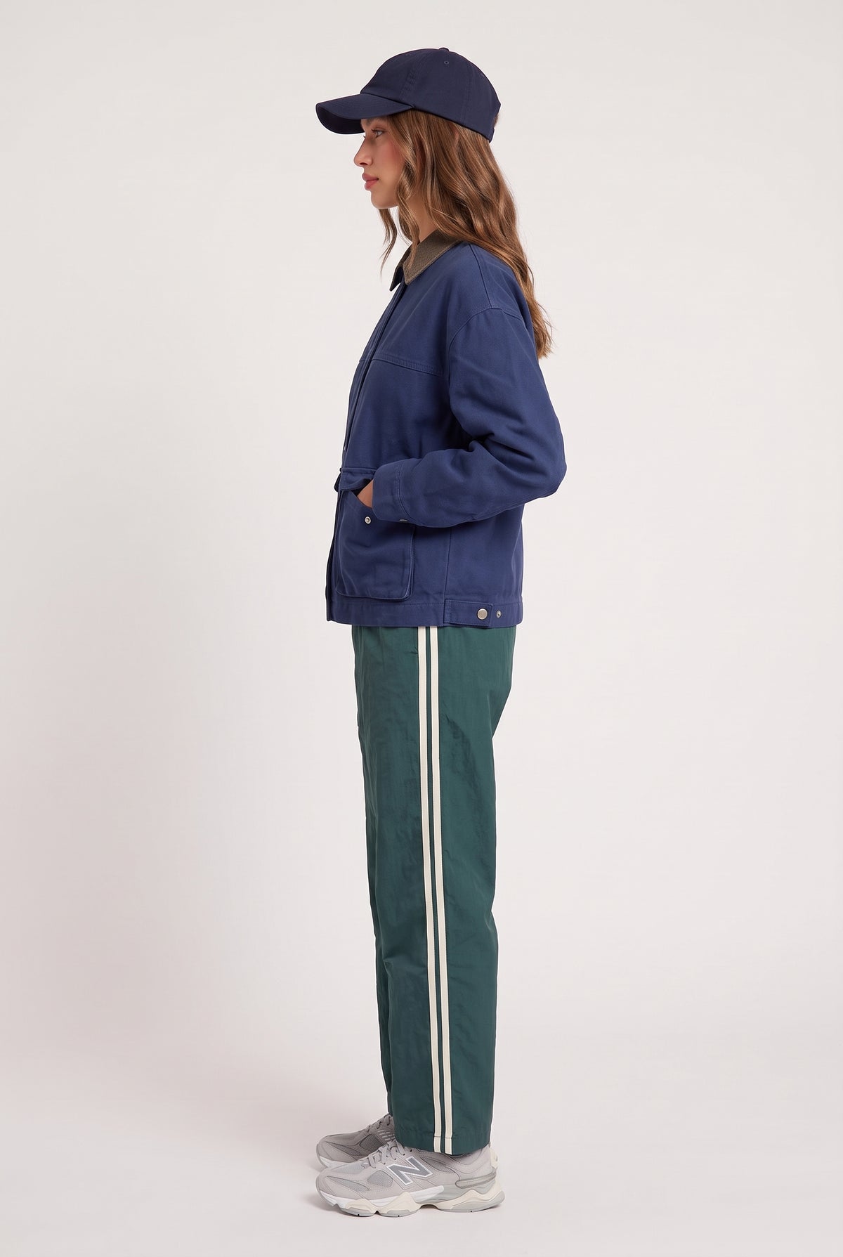[GREEN] model wearing Downtown Track Pant posing Side View