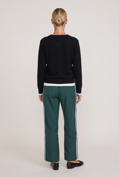 
model wearing Mai Layered Vneck Sweater posing Front View