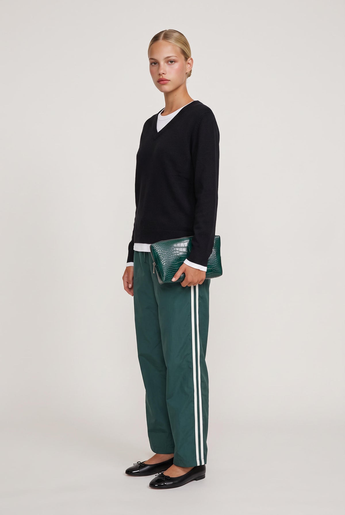 
model wearing Mai Layered Vneck Sweater posing Front View
