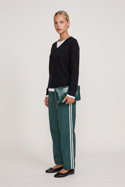 
model wearing Mai Layered Vneck Sweater posing Front View