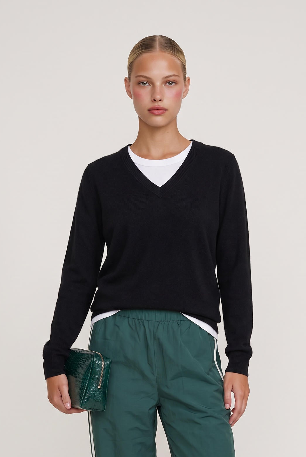
model wearing Mai Layered Vneck Sweater posing Front View
