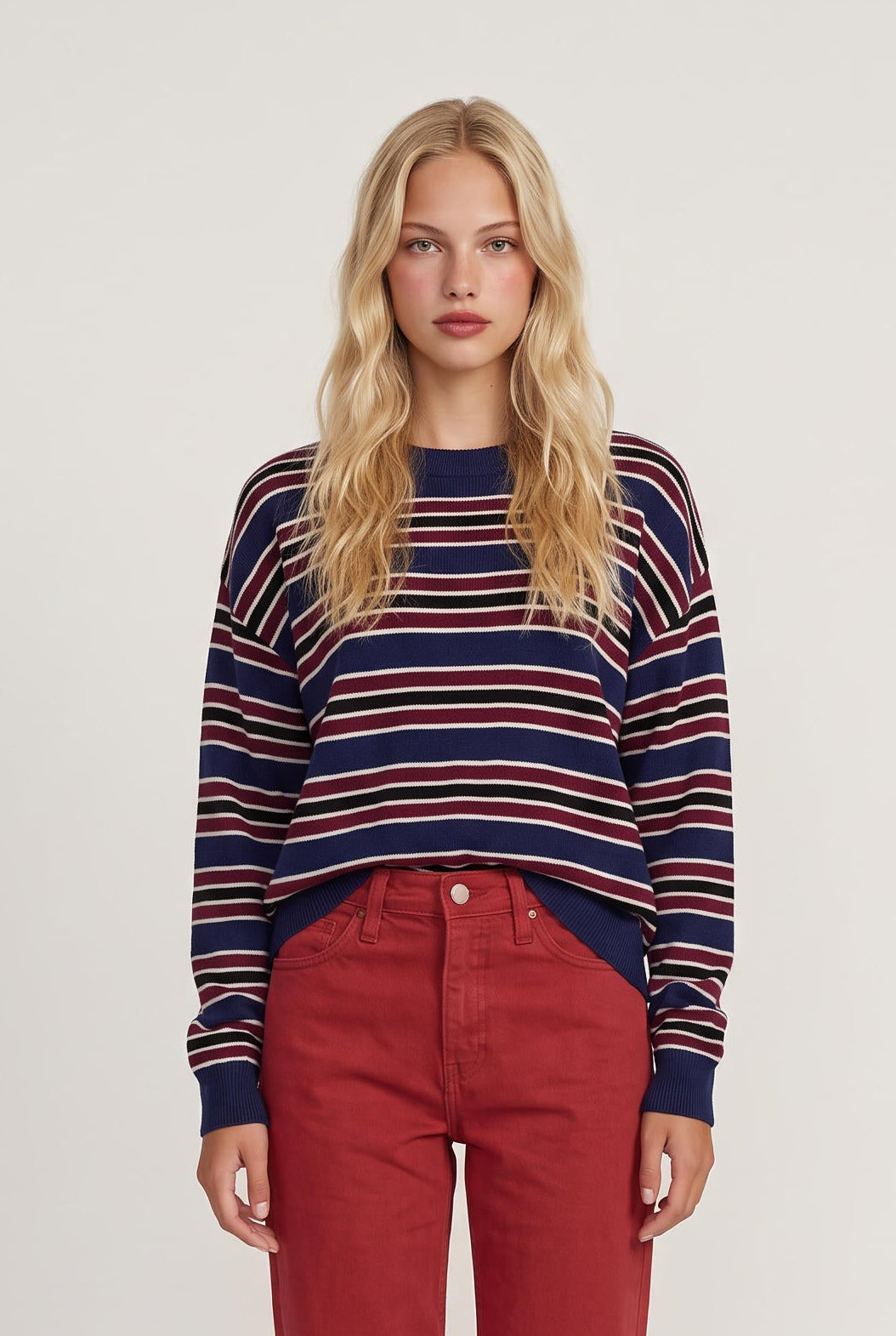 
model wearing Rebel Striped Sweater posing Front View