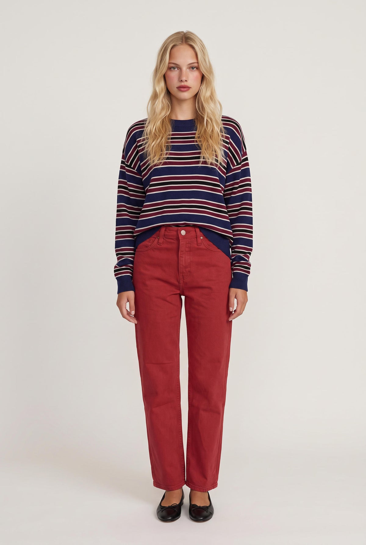 
model wearing Rebel Striped Sweater posing Front View
