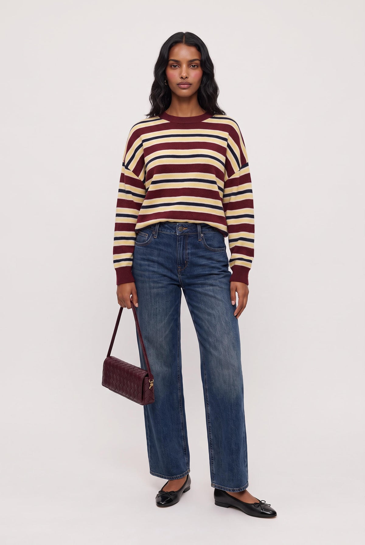 [RED] model wearing Rebel Striped Sweater posing Front View