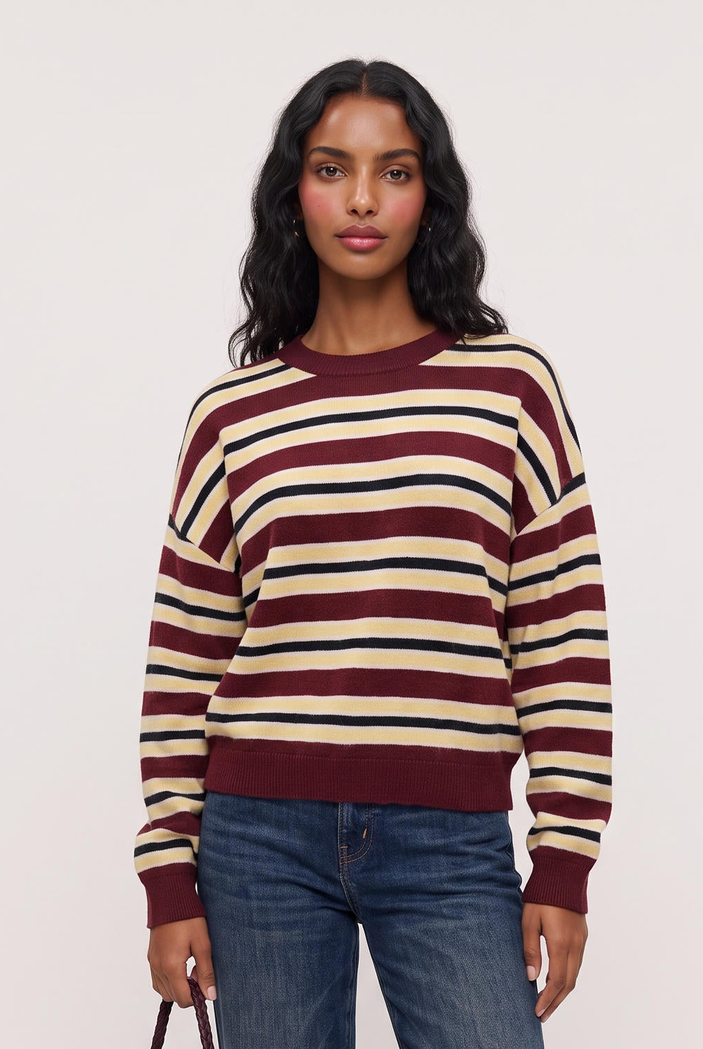 
model wearing Rebel Striped Sweater posing Front View