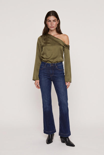 
model wearing Celeste Asymmetrical Top posing Front View