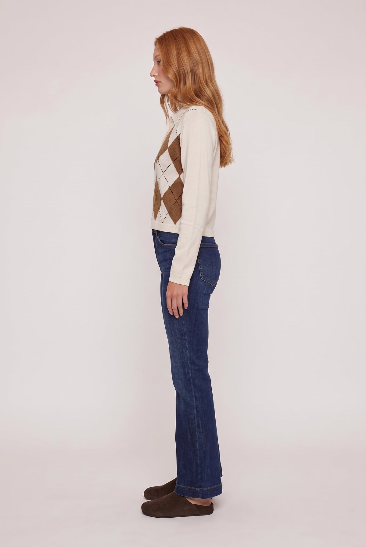 [CREAM] model wearing Morris Cropped Polo posing Side View