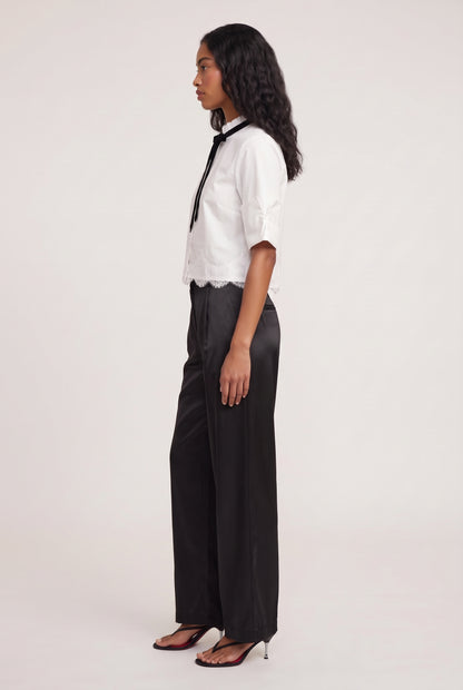
model wearing Taylor Poplin Button Down Shir posing Side View
