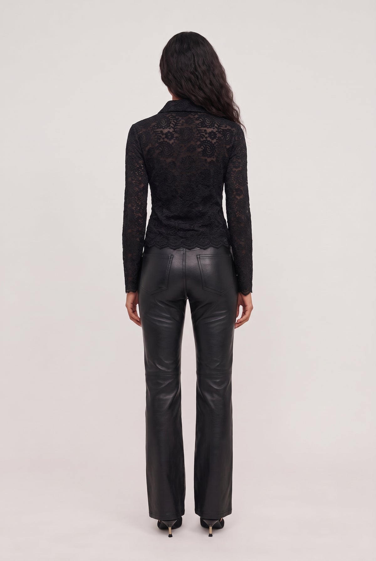 
model wearing Nina Lace Button Up Top posing Back View