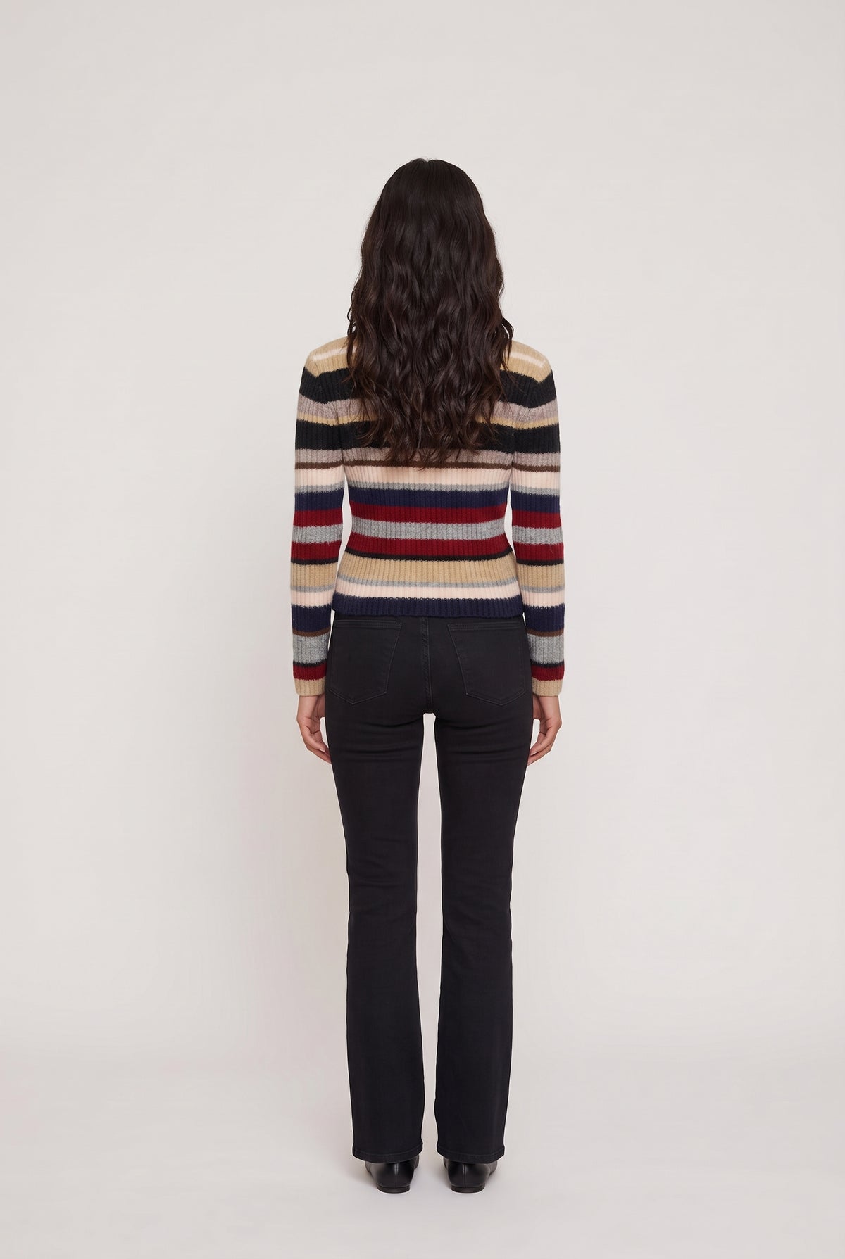 
model wearing Stella Stripe Sweater posing Back View