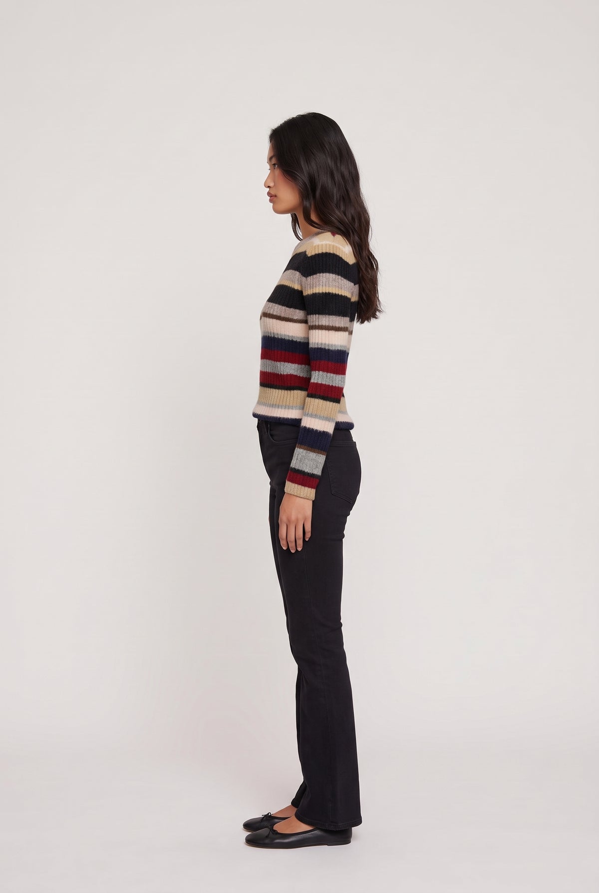 
model wearing Stella Stripe Sweater posing Side View
