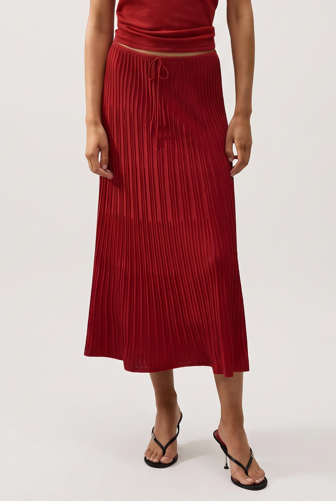 
model wearing Citara Drawstring Midi Skirt posing Front View