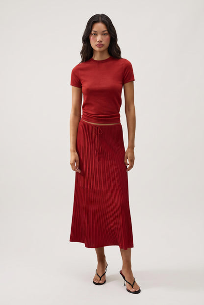 
model wearing Citara Drawstring Midi Skirt posing Front View