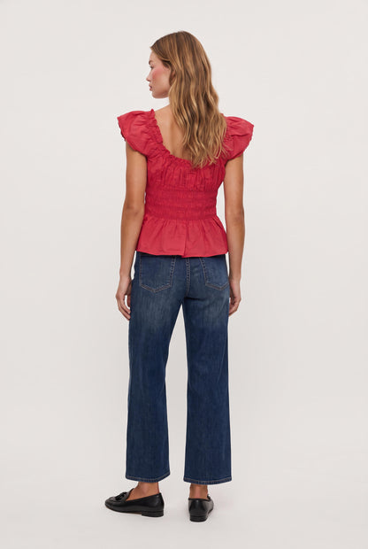 
model wearing Janaina Ruched Top posing Front View