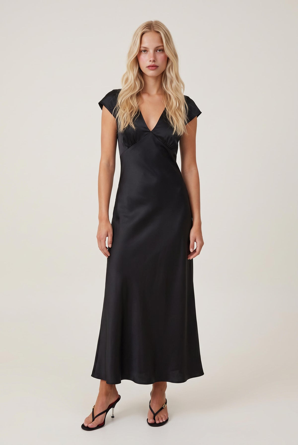 [BLACK] model wearing Mina Midi V-neck Dress posing Front View