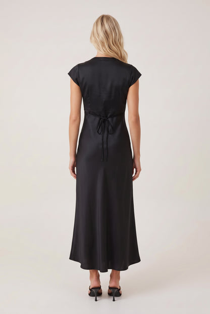 
model wearing Mina Midi V-neck Dress posing Back View