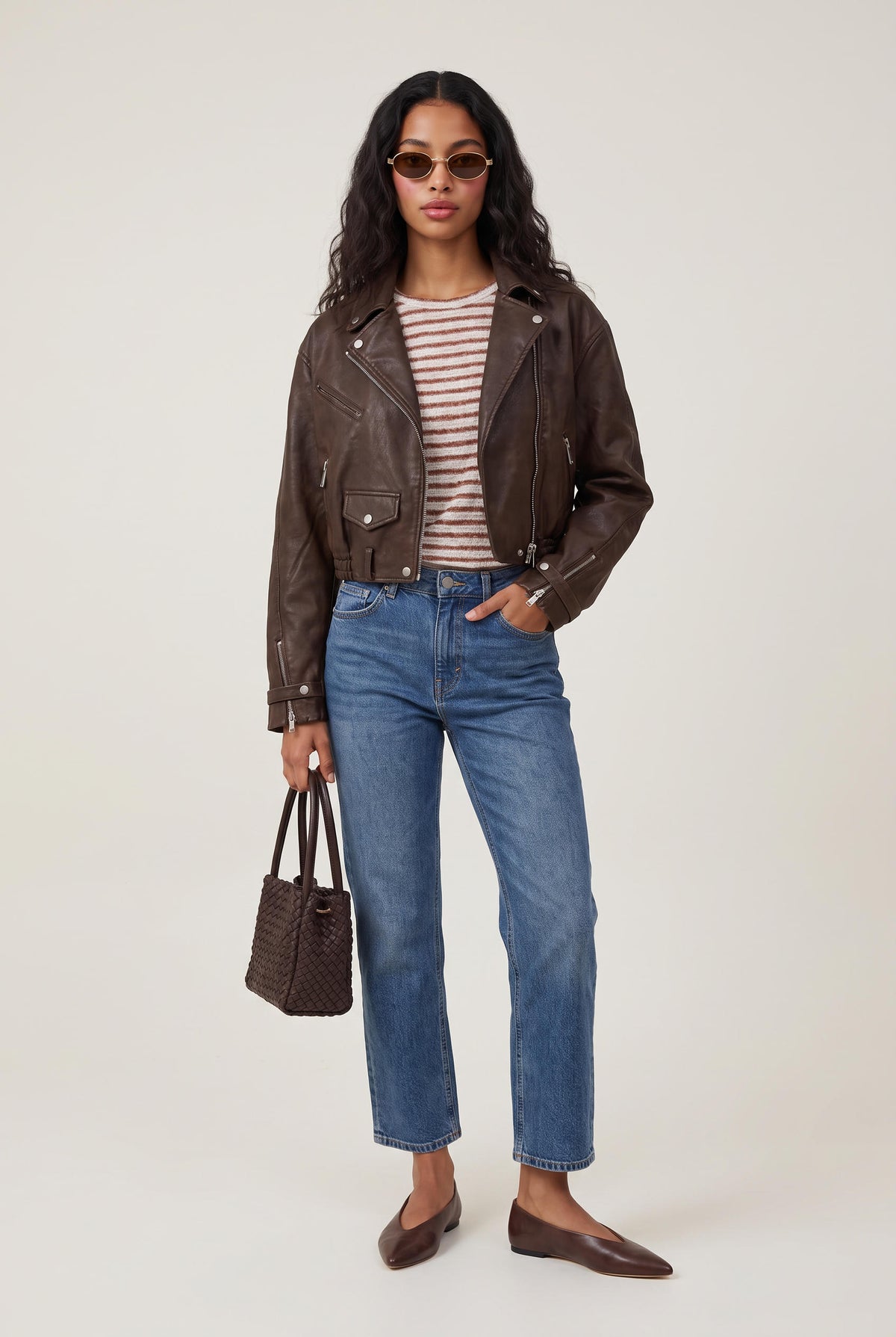[DENIM] model wearing High Rise Slim Wide Crop posing Front View