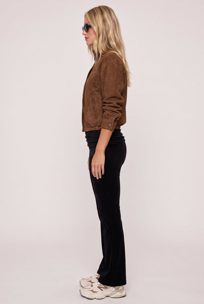 
model wearing Jayce Roll Over Pant posing Side View