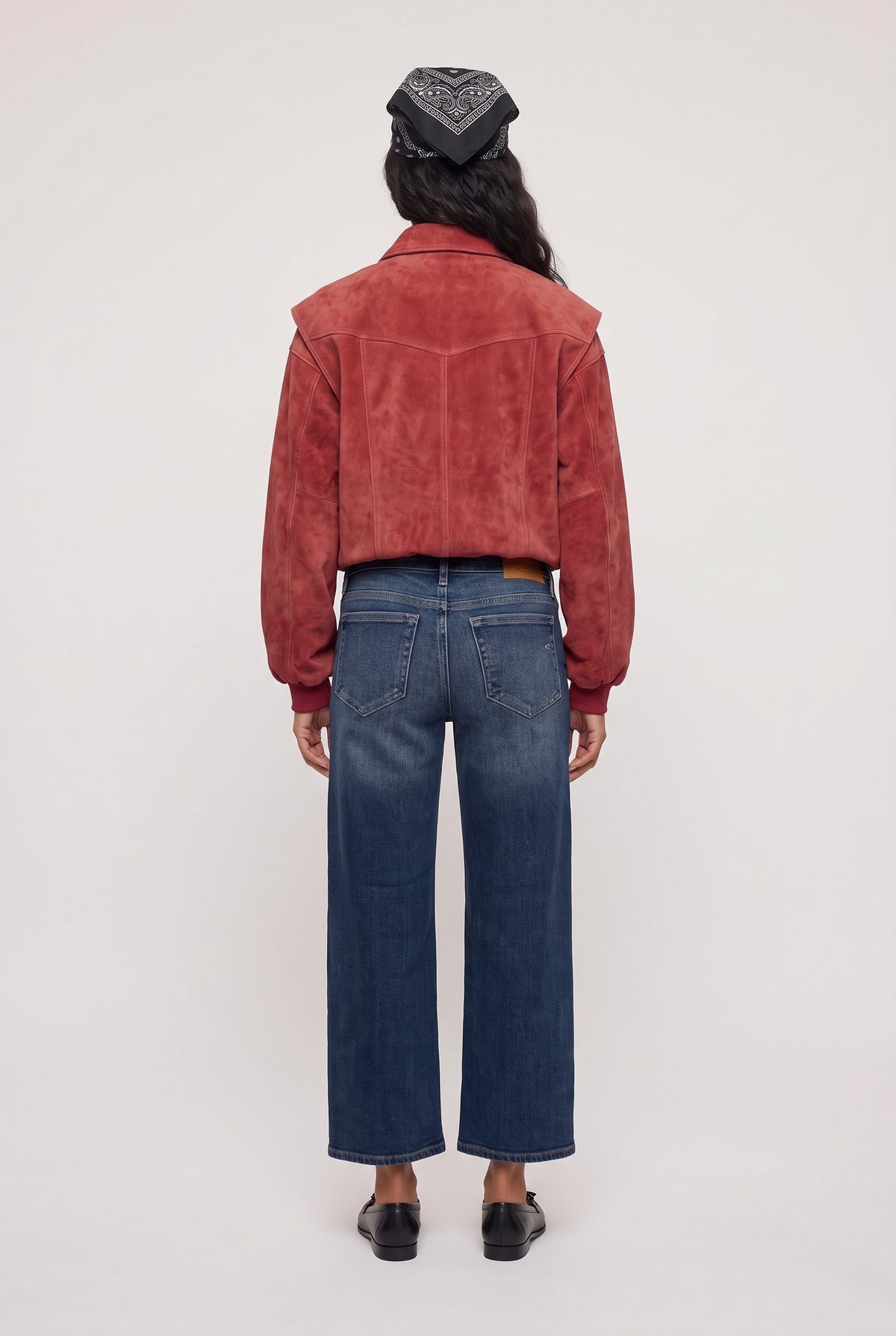[DENIM] model wearing Logan Low Rise Dad posing Back View