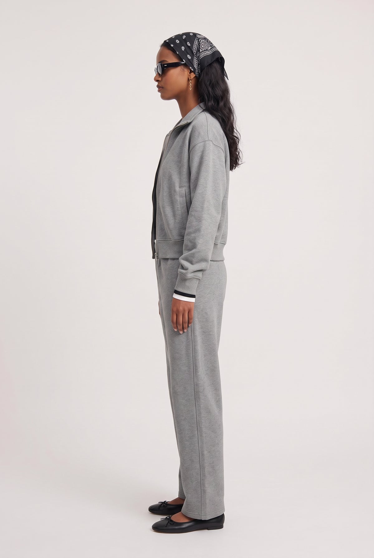 
model wearing Everyday Sweatpant posing Side View