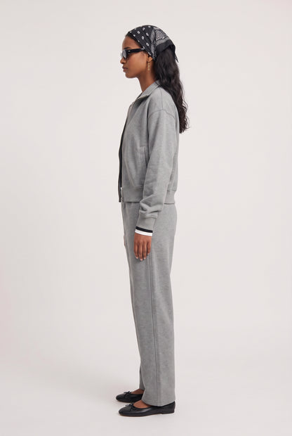 
model wearing Everyday Sweatpant posing Side View