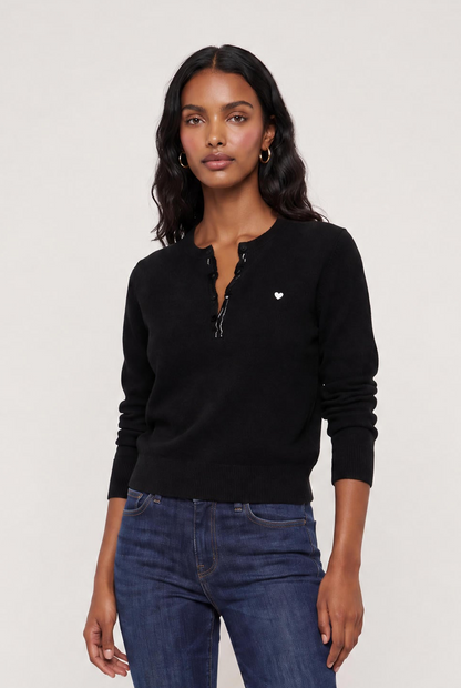 
model wearing Femme Ruffle Henley Sweater posing Front View