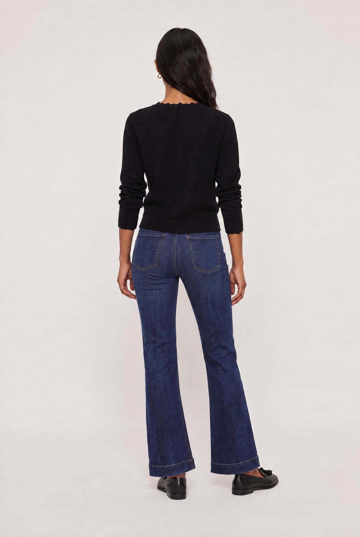 
model wearing Femme Ruffle Henley Sweater posing Front View