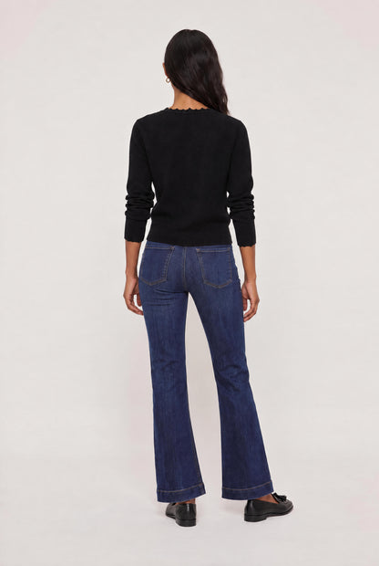
model wearing Femme Ruffle Henley Sweater posing Front View