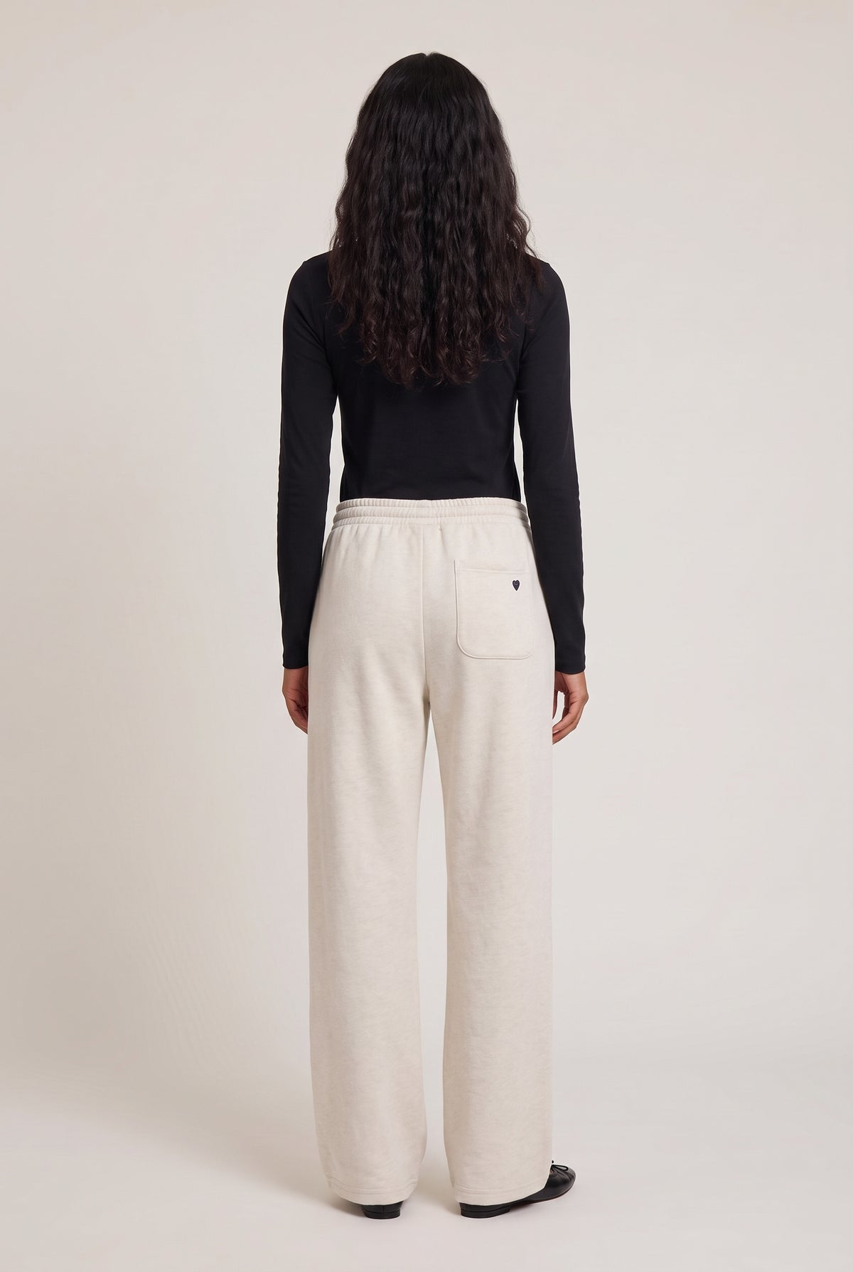 
model wearing Weekend Barb Sweatpant posing Back View