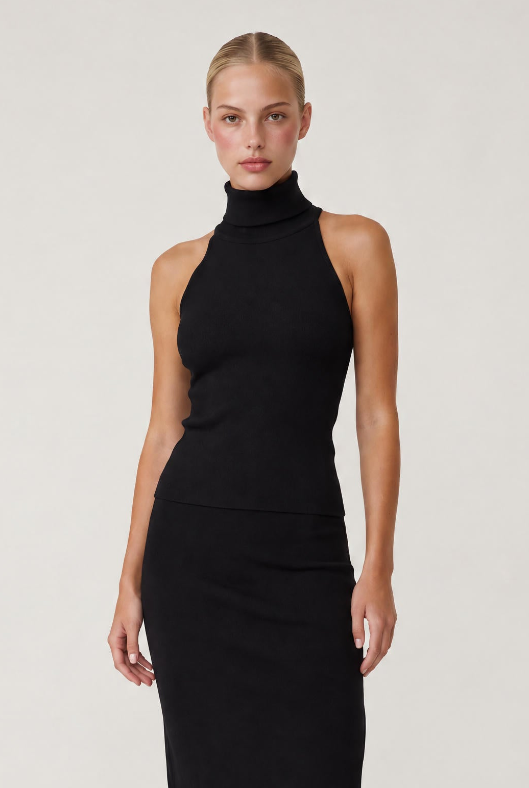 
model wearing After Hours Top posing Front View